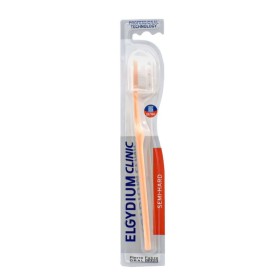 ELGYDIUM Clinic 25/100 Brush & Care Οδοντόβουρτσα Μέτρια Χρώμα Πορτοκαλί 1 Τεμάχιο